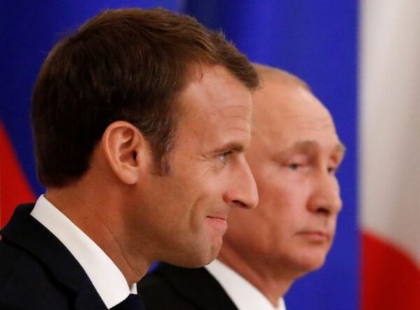 russian president putin and his french counterpart macron attend a signing ceremony in st. petersburg