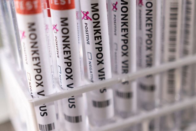 file photo: illustration shows test tubes labelled "monkeypox virus positive